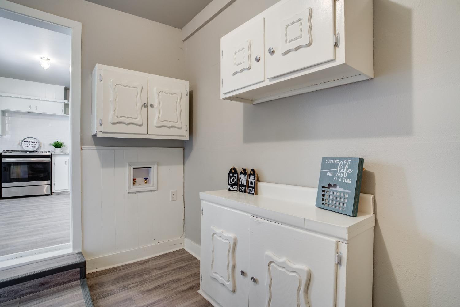 4629 Elgin Avenue Lubbock, TX 79413 - Photo 21 of 34 a utility room with dryer and washer