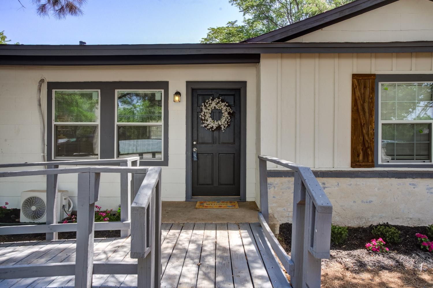 4629 Elgin Avenue Lubbock, TX 79413 - Photo 3 of 34 a view of a porch with a table and chairs
