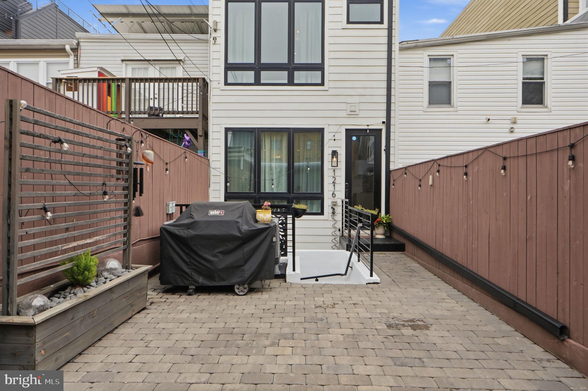 1216 I Street Northeast, Unit B Washington, DC 20002 - Photo 31 of 40 Private, secured parking on the large paver patio