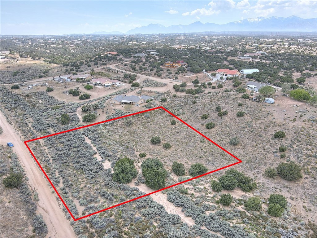 0 Verbena Road Oak Hills, CA 92344 - Photo 13 of 17 an aerial view of beach and residential space