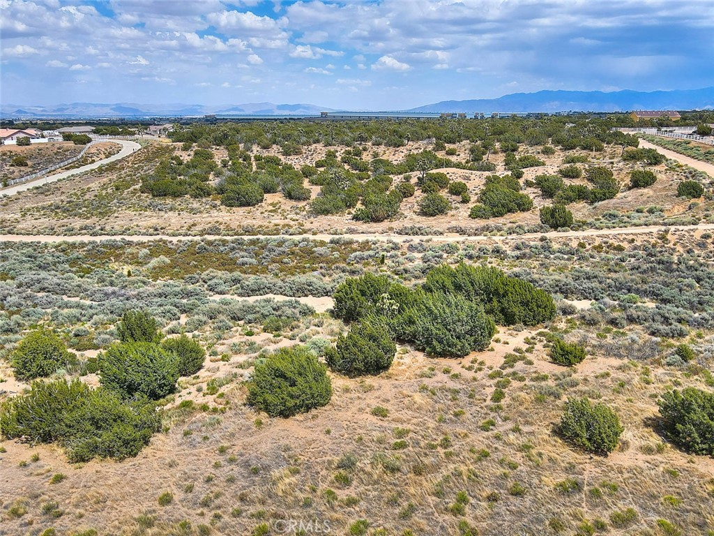 0 Verbena Road Oak Hills, CA 92344 - Photo 8 of 17 a view of a field with an ocean view