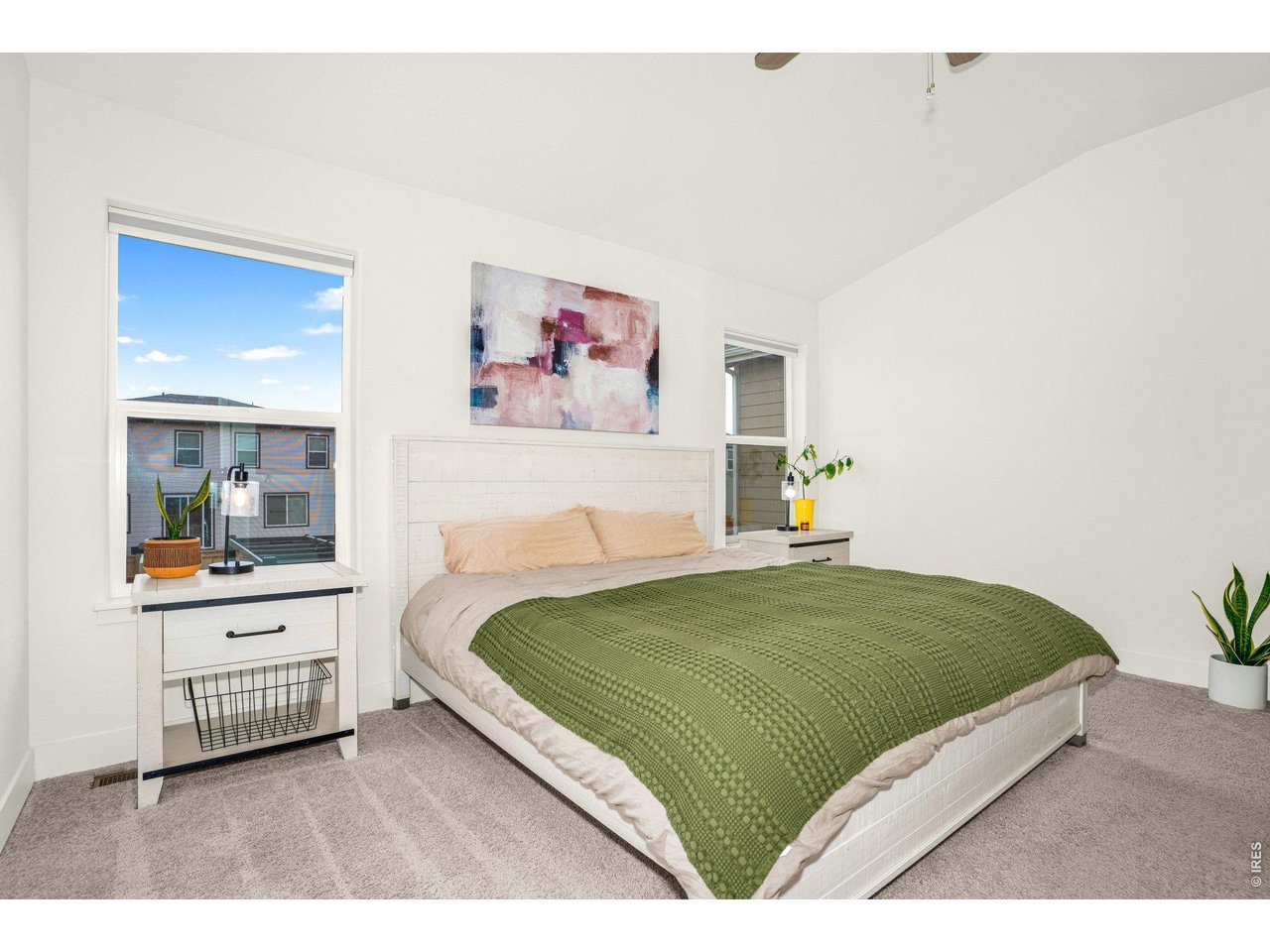 934 Milner Pass Road Severance, CO 80550 - Photo 12 of 33 Enjoy the ease and comfort of a thoughtfully designed main-floor primary bedroom, offering a private retreat with the convenience of everyday living all on one level!