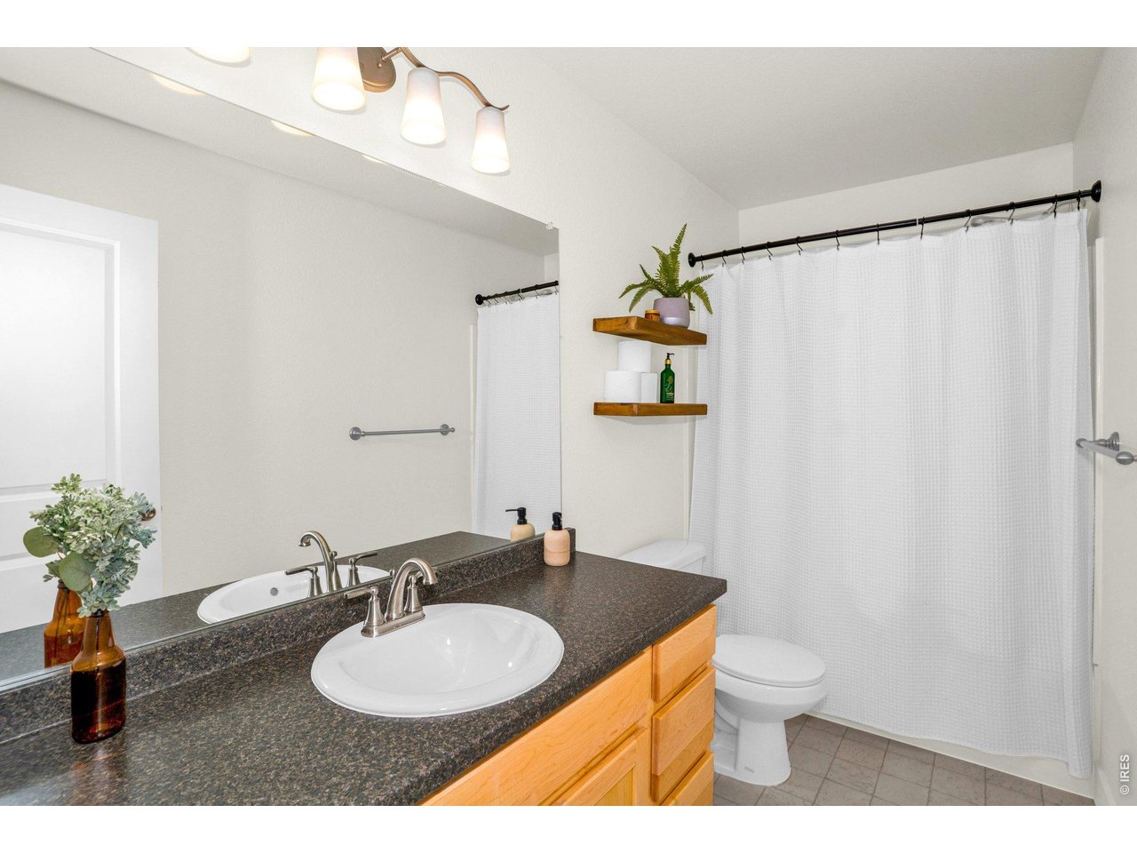 934 Milner Pass Road Severance, CO 80550 - Photo 20 of 33 Large full bathroom upstairs