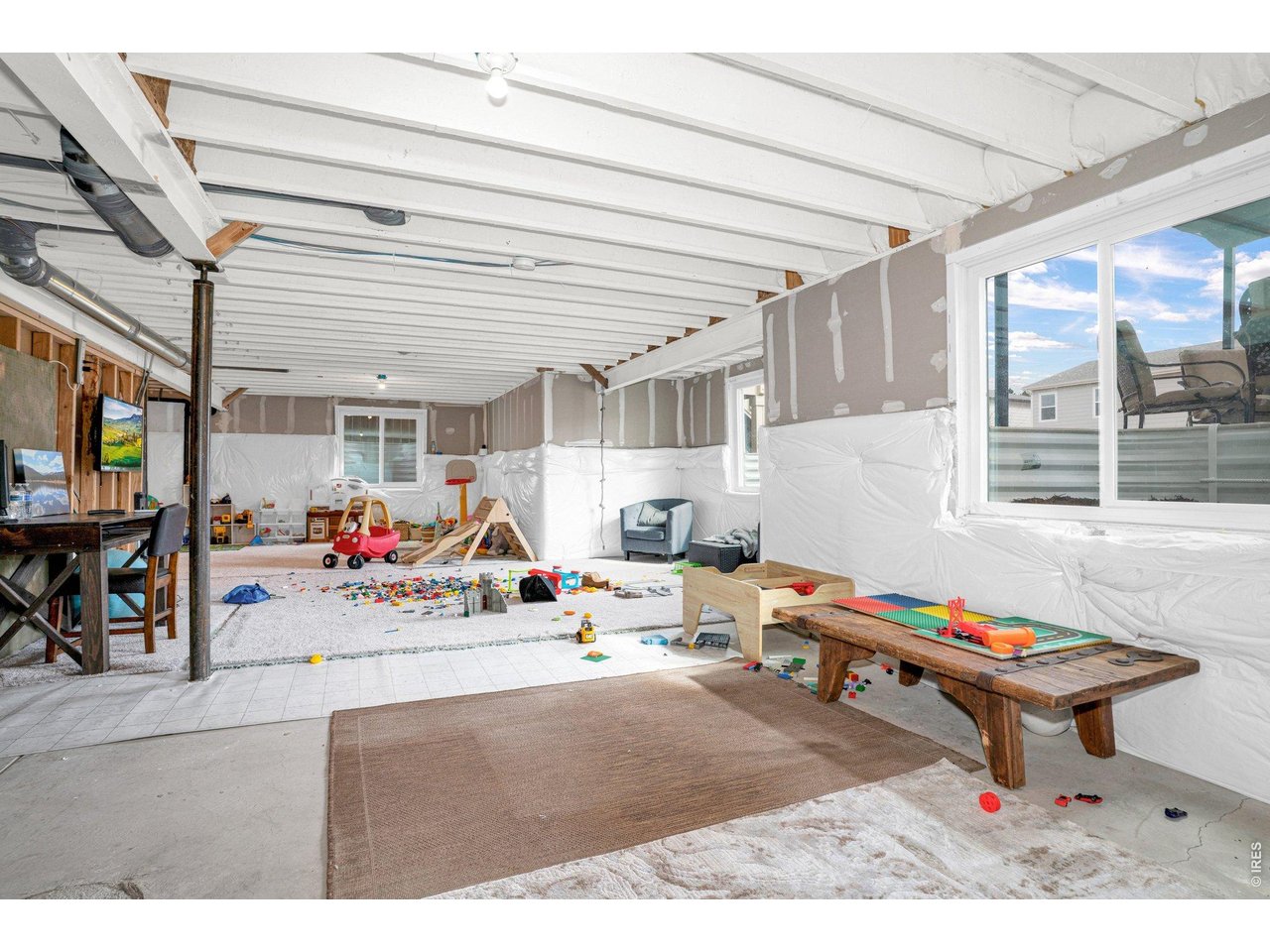 934 Milner Pass Road Severance, CO 80550 - Photo 21 of 33 Full unfinished basement is a clean slate to use as you need!