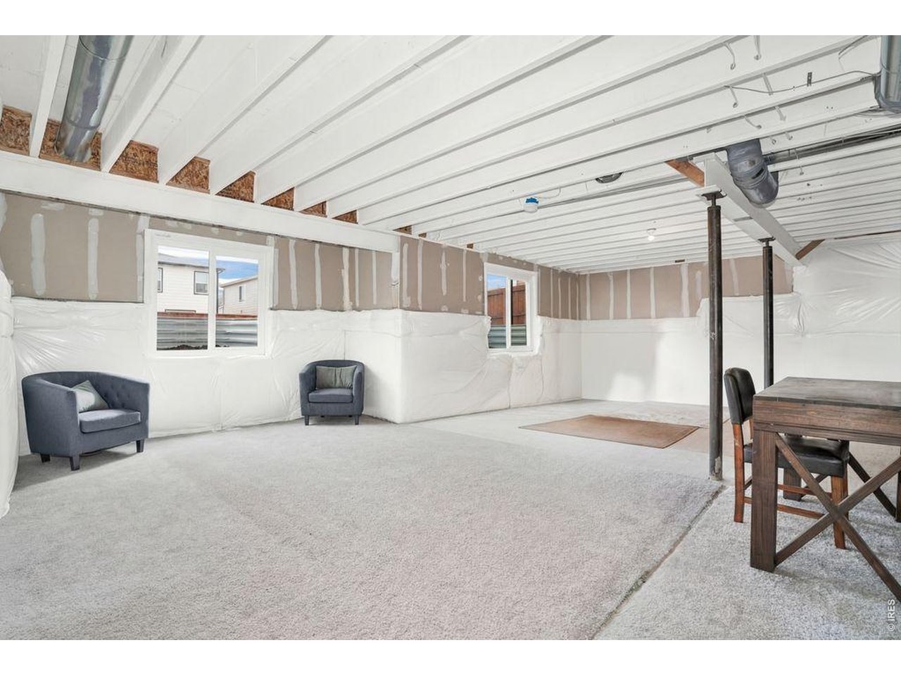 934 Milner Pass Road Severance, CO 80550 - Photo 21 of 35 Garden level basement allows for lots of natural light!