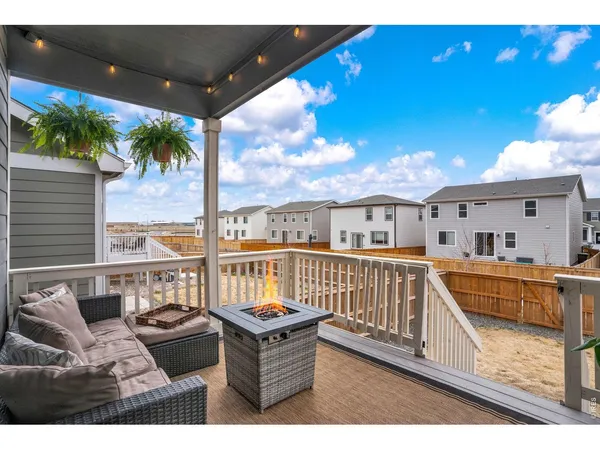 a outdoor living space with furniture and a potted plant