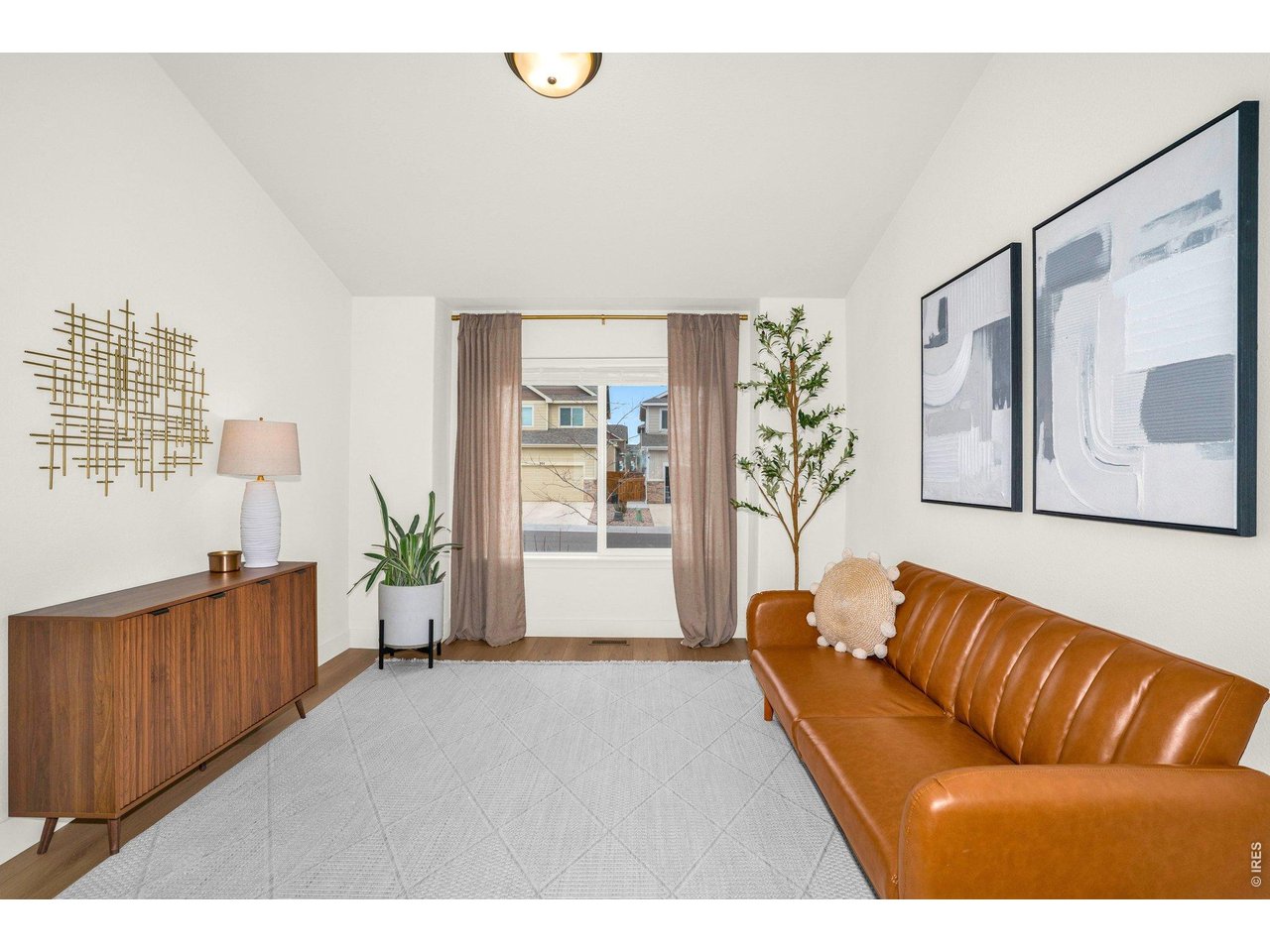 934 Milner Pass Road Severance, CO 80550 - Photo 3 of 33 The front living room has natural light, and is the perfect place for quiet moments.