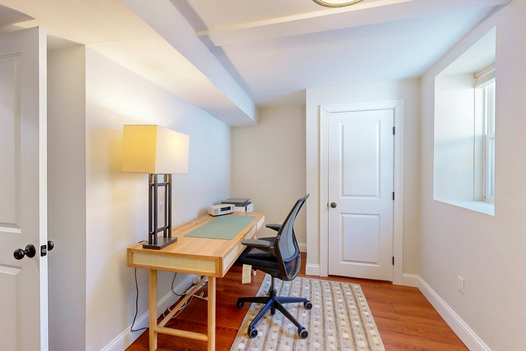 96 Floral Street, Unit 1 Newton, MA 02461 - Photo 35 of 42 a view of a room with gym equipment