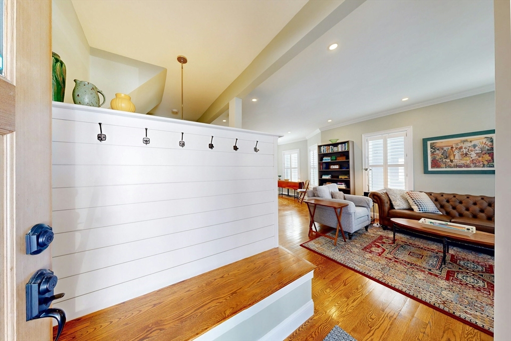 96 Floral Street, Unit 1 Newton, MA 02461 - Photo 4 of 42 a living room with furniture and a table