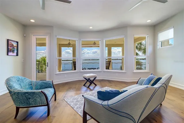 an aerial view of residential house with outdoor space and lake view