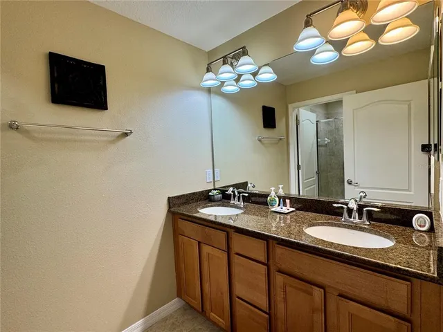 a view of a backyard with sitting area