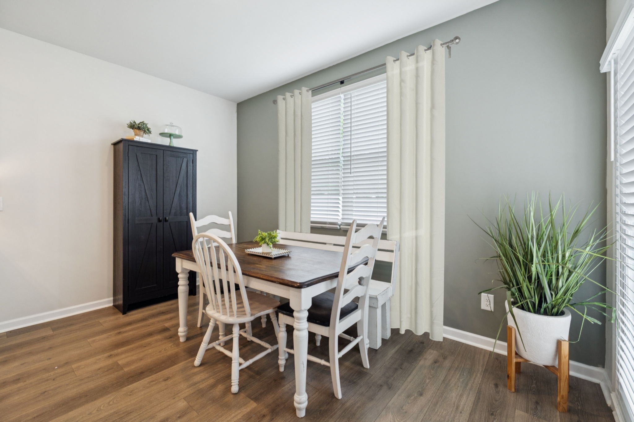 868 Long Leaf Road Lebanon, TN 37087 - Photo 12 of 40 a view of a dining room with furniture window and wooden floor
