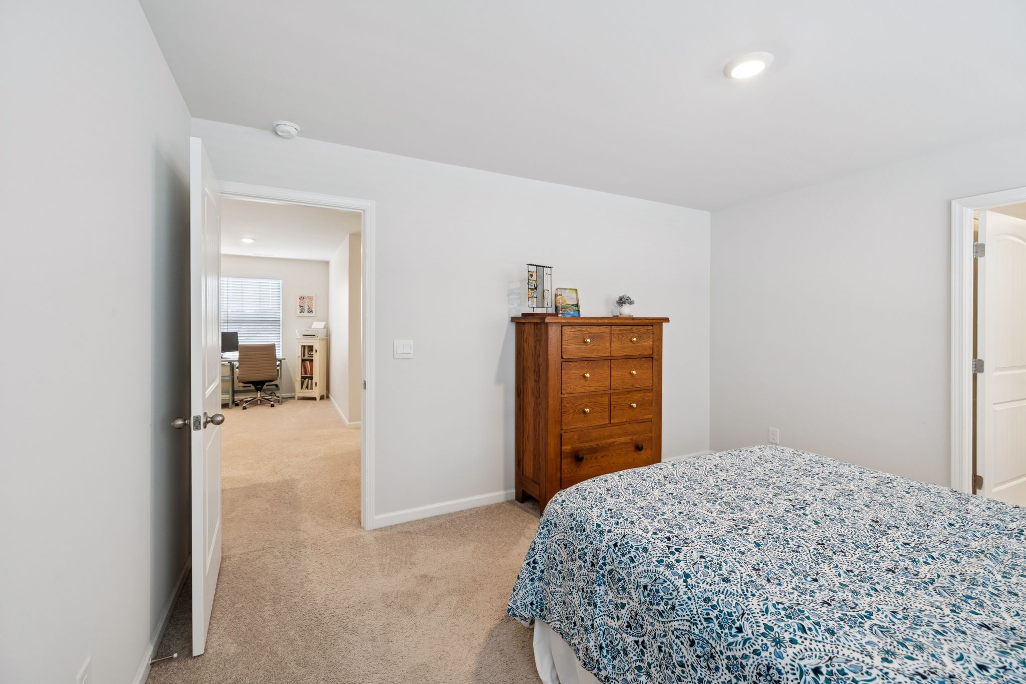 868 Long Leaf Road Lebanon, TN 37087 - Photo 15 of 40 a bedroom with a bed and a mirror