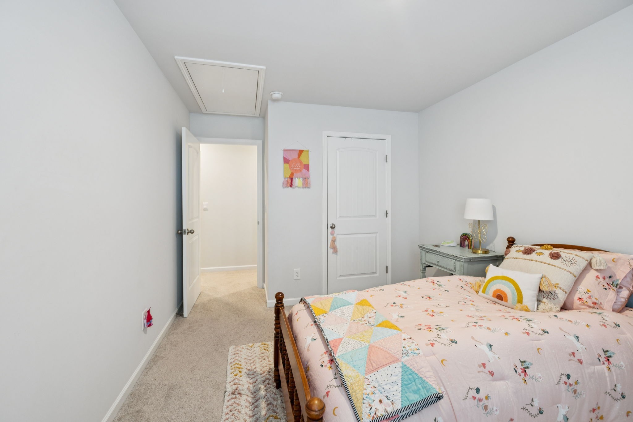 868 Long Leaf Road Lebanon, TN 37087 - Photo 17 of 40 a bed room with a bed and a refrigerator