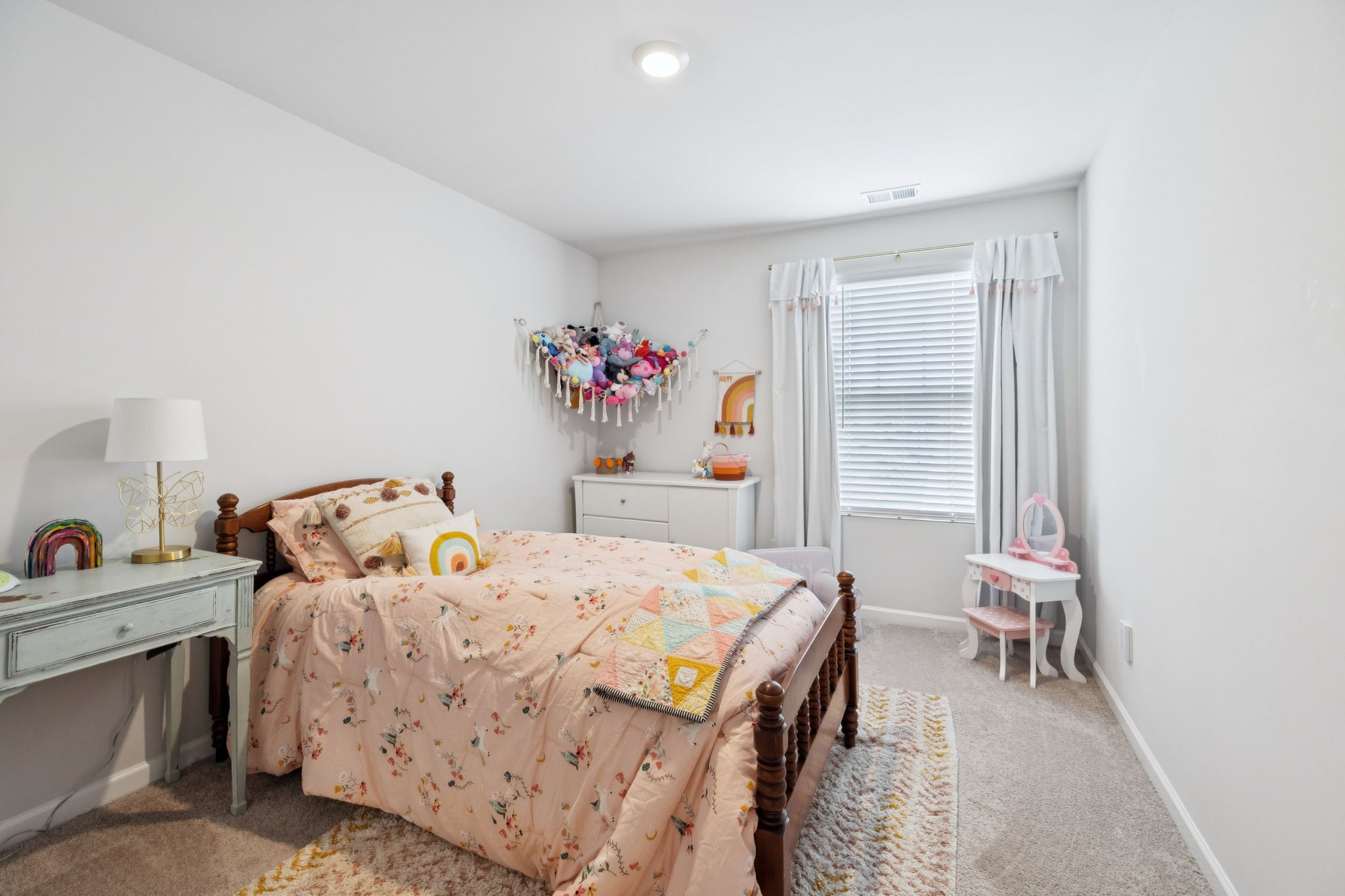 868 Long Leaf Road Lebanon, TN 37087 - Photo 18 of 40 a bedroom with a bed and a table in it