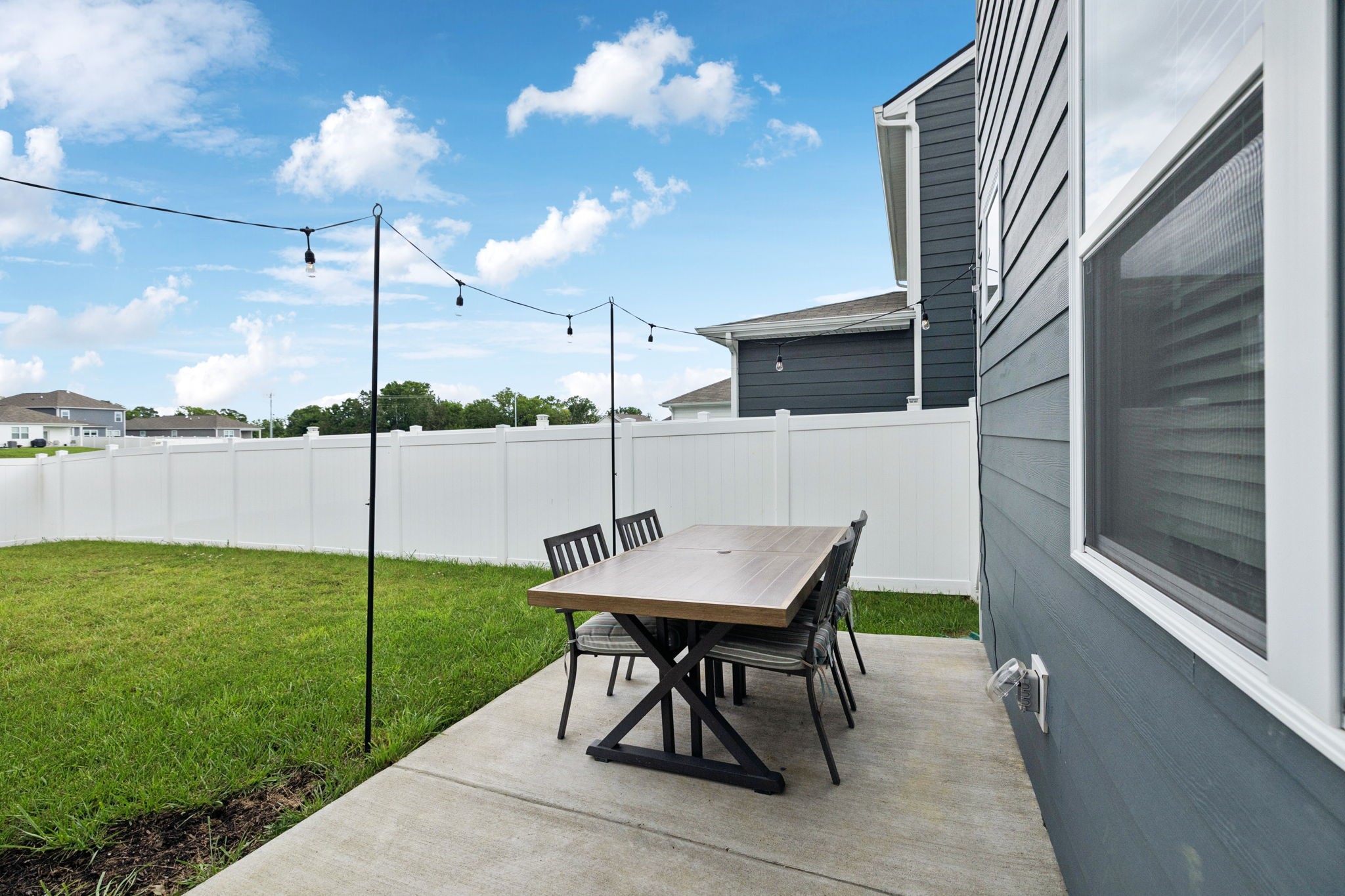 868 Long Leaf Road Lebanon, TN 37087 - Photo 26 of 40 a view of an chairs and table in the patio
