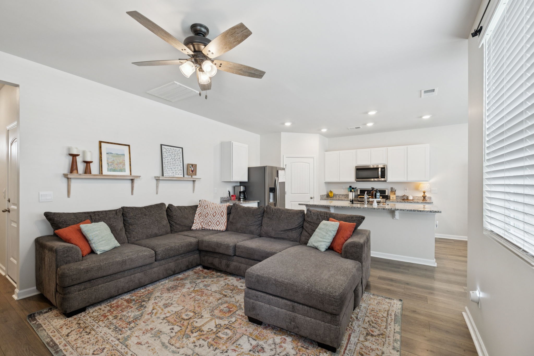 868 Long Leaf Road Lebanon, TN 37087 - Photo 3 of 40 a living room with furniture and kitchen view