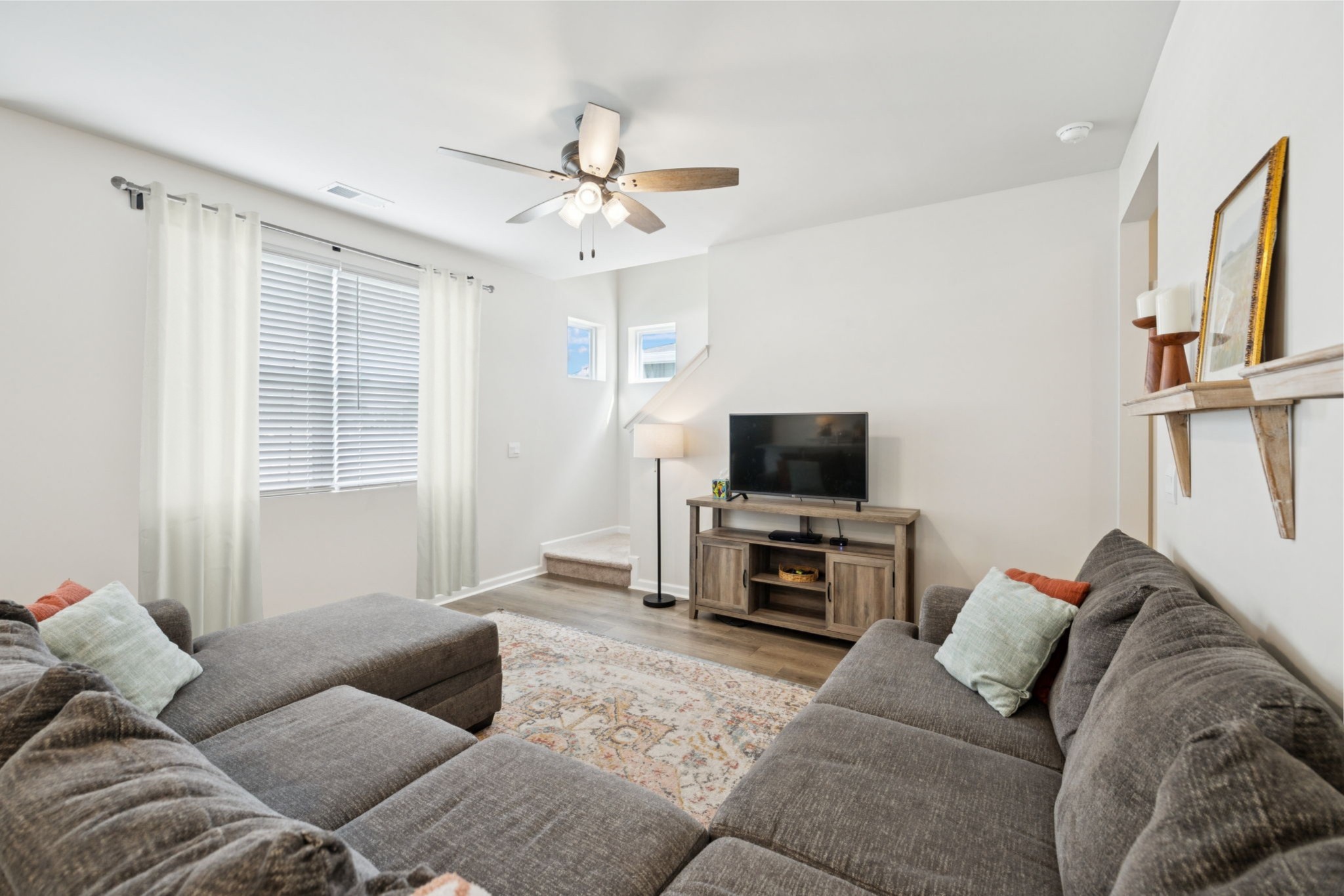 868 Long Leaf Road Lebanon, TN 37087 - Photo 4 of 40 a living room with furniture and a flat screen tv