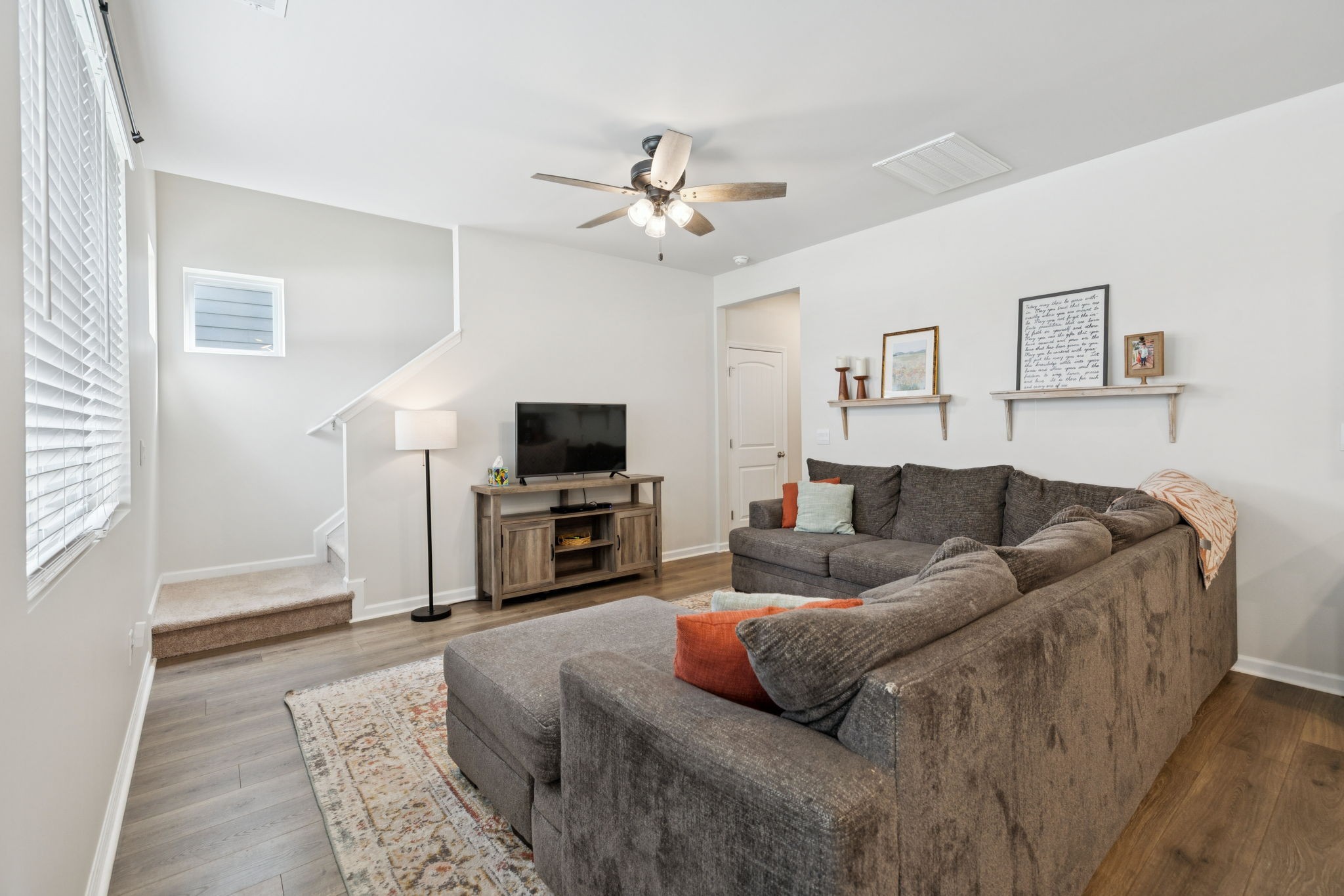 868 Long Leaf Road Lebanon, TN 37087 - Photo 5 of 40 a living room with furniture and a flat screen tv