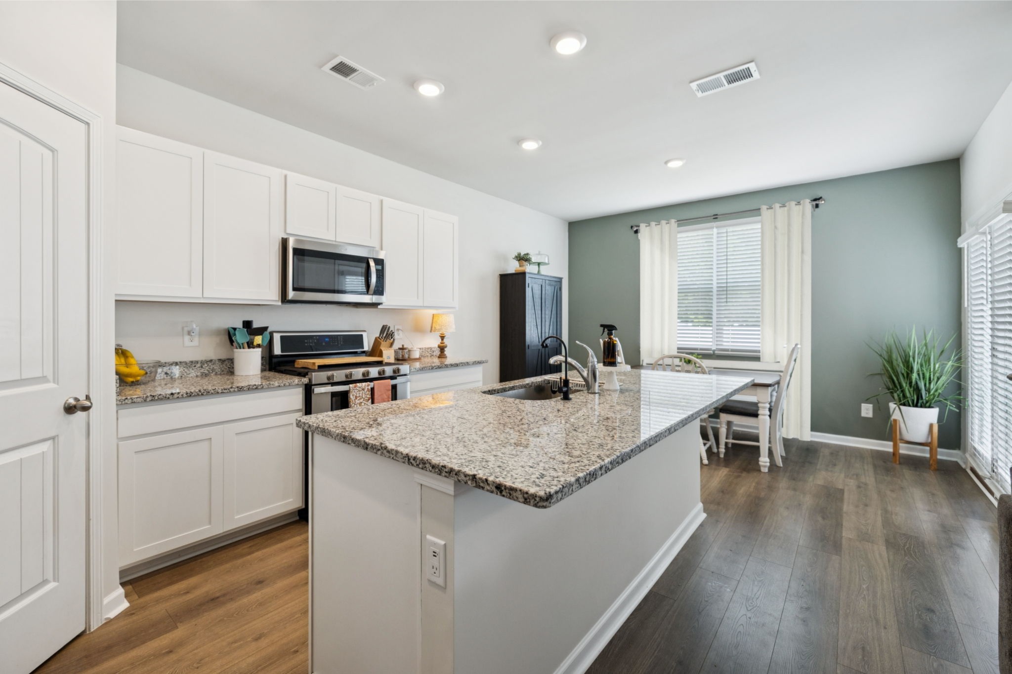868 Long Leaf Road Lebanon, TN 37087 - Photo 7 of 40 a kitchen with a sink stove and refrigerator