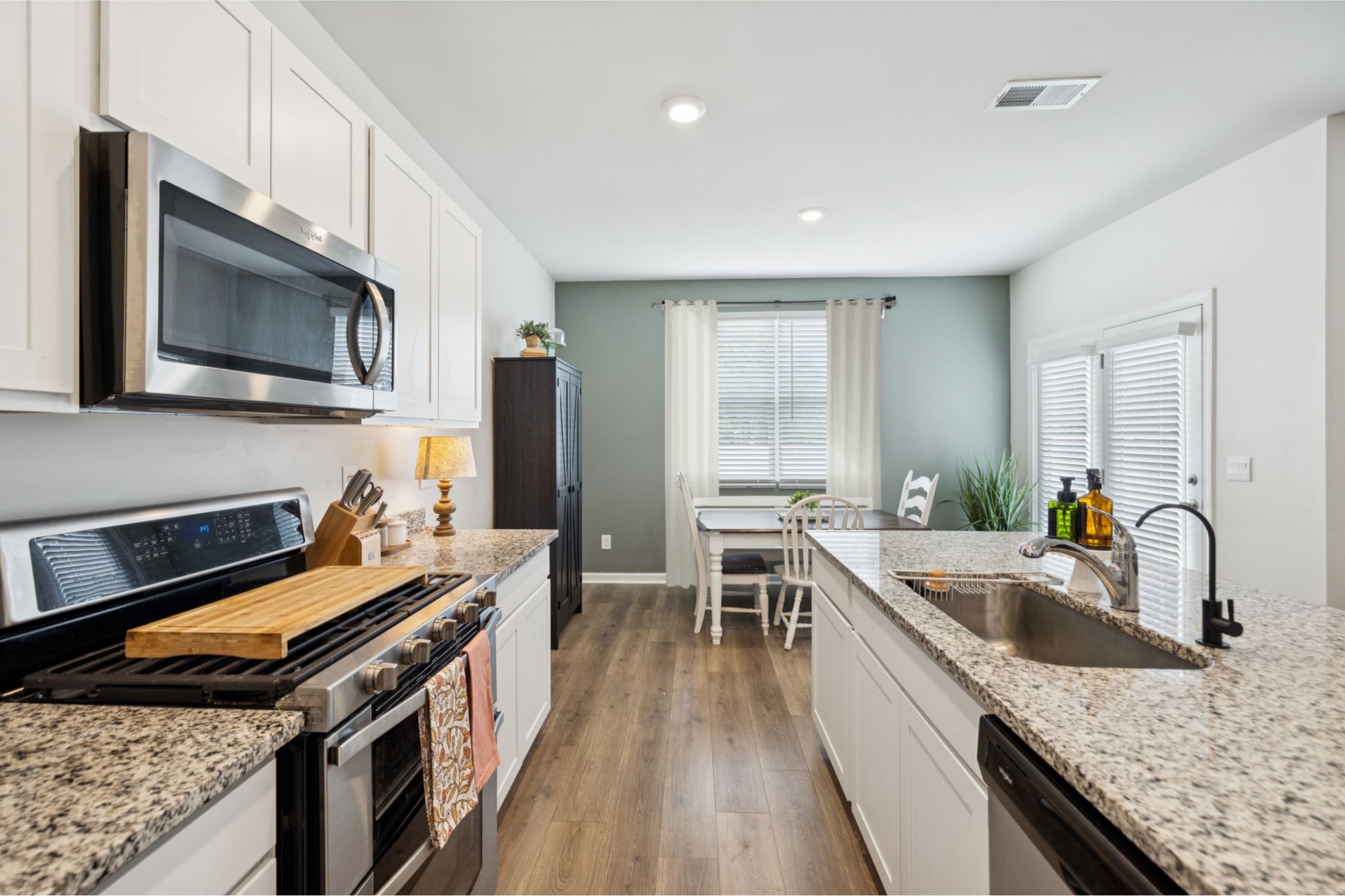 868 Long Leaf Road Lebanon, TN 37087 - Photo 8 of 40 a kitchen with a stove sink and microwave