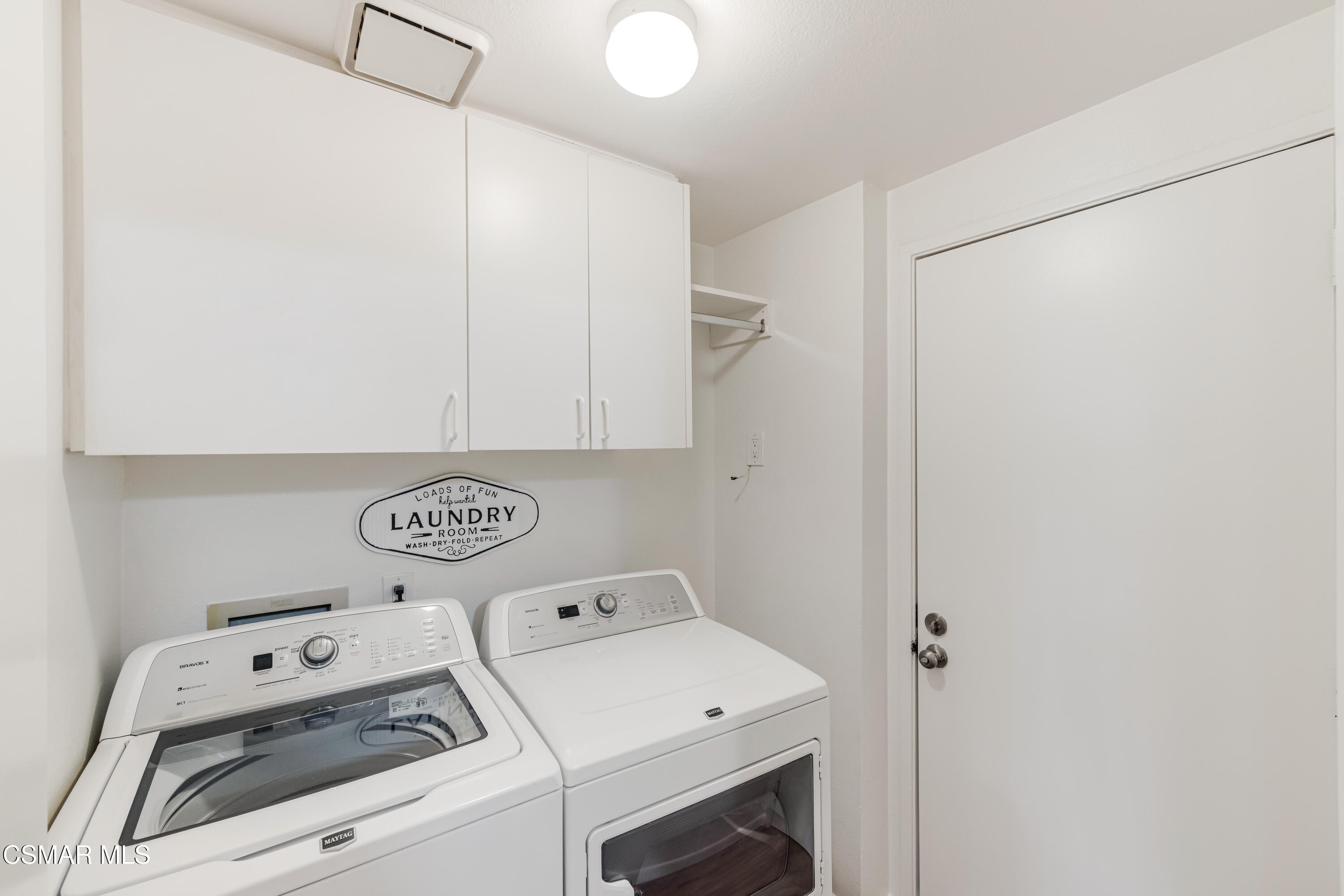 4240 Lost Hills Road, Unit 1902 Calabasas, CA 91301 - Photo 14 of 37 a utility room with dryer and washer