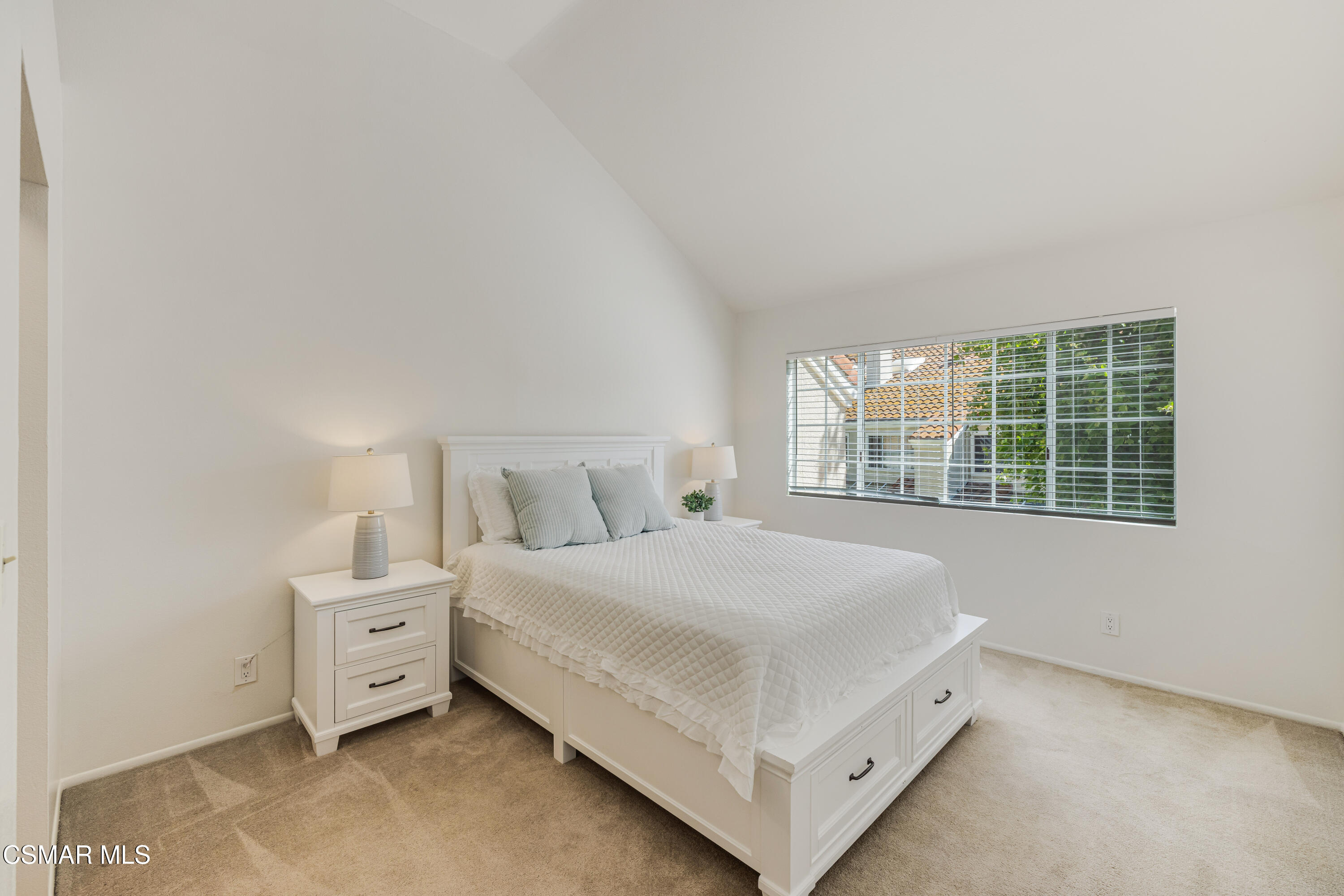 4240 Lost Hills Road, Unit 1902 Calabasas, CA 91301 - Photo 18 of 37 a bedroom with a bed and a window