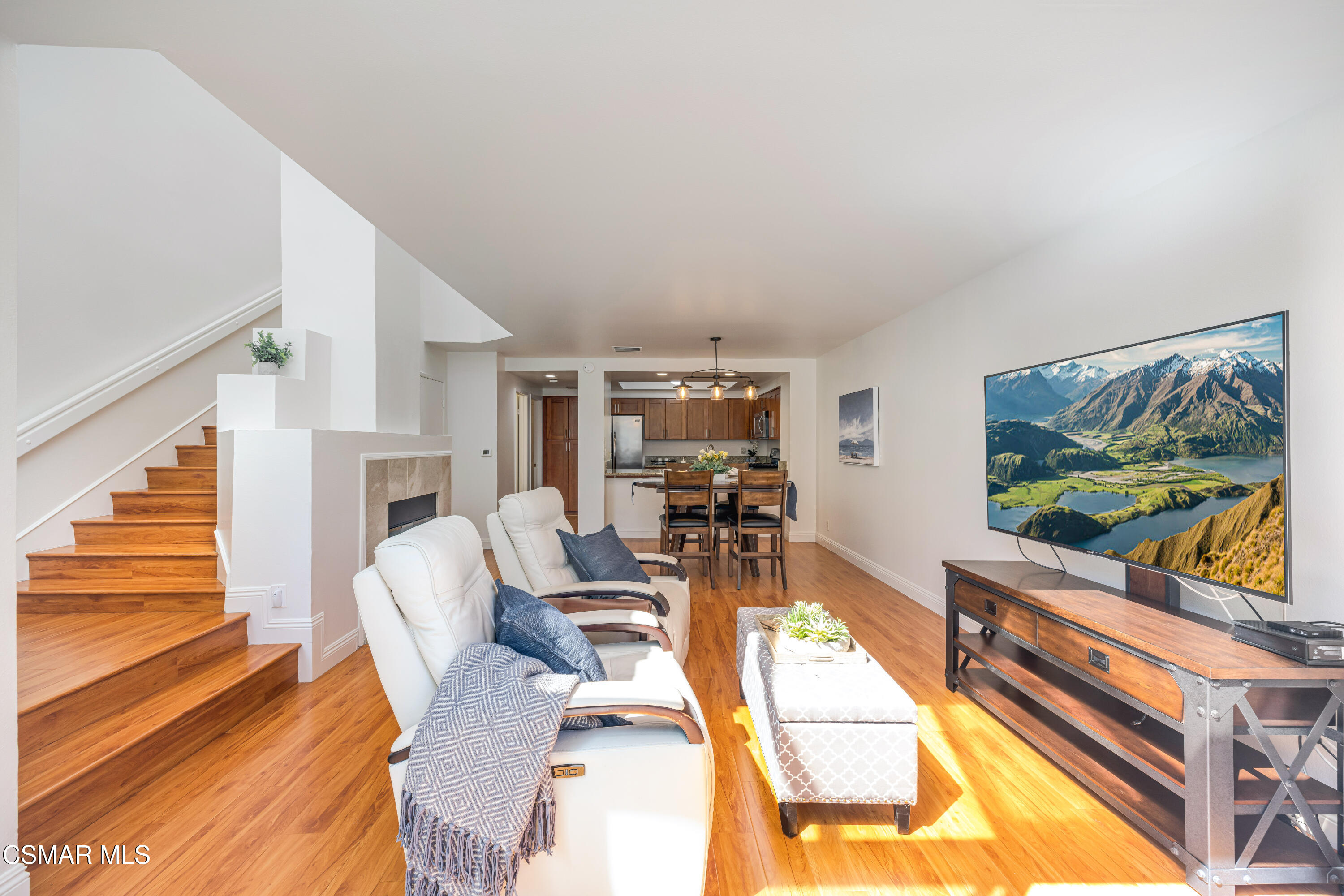 4240 Lost Hills Road, Unit 1902 Calabasas, CA 91301 - Photo 25 of 37 a living room with furniture and a flat screen tv