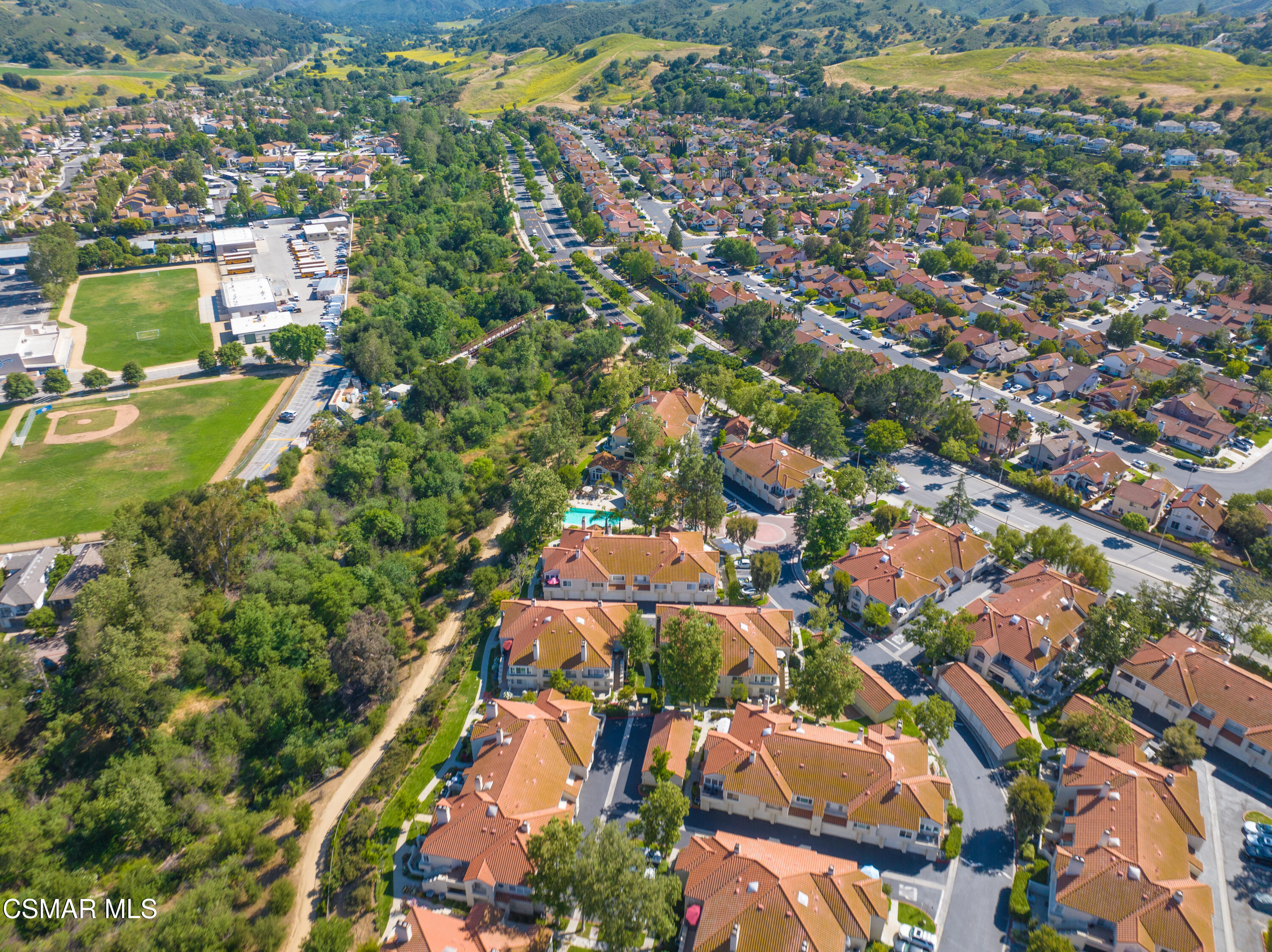 4240 Lost Hills Road, Unit 1902 Calabasas, CA 91301 - Photo 34 of 37 an aerial view of residential houses with outdoor space