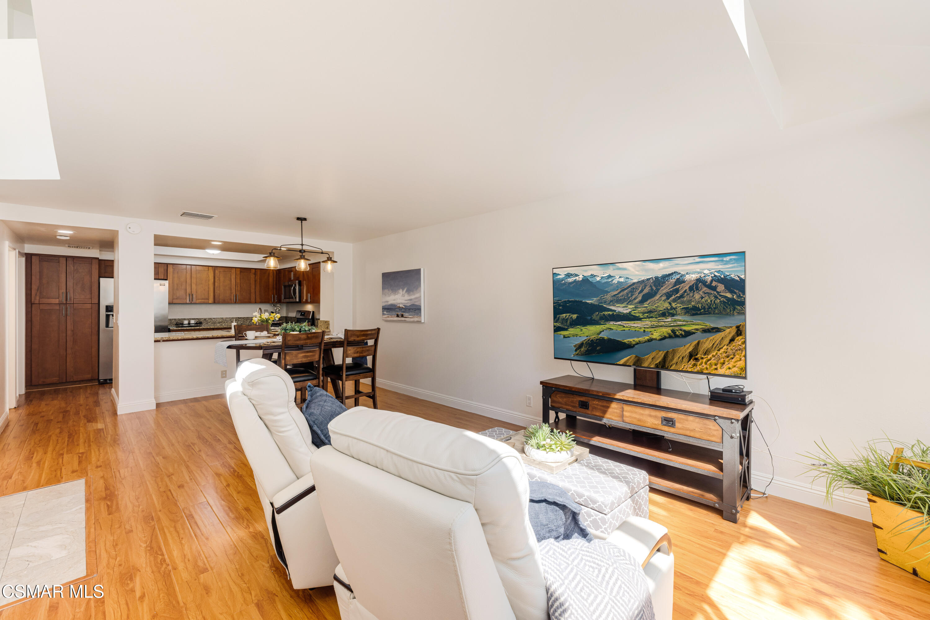4240 Lost Hills Road, Unit 1902 Calabasas, CA 91301 - Photo 7 of 37 a living room with furniture and a flat screen tv