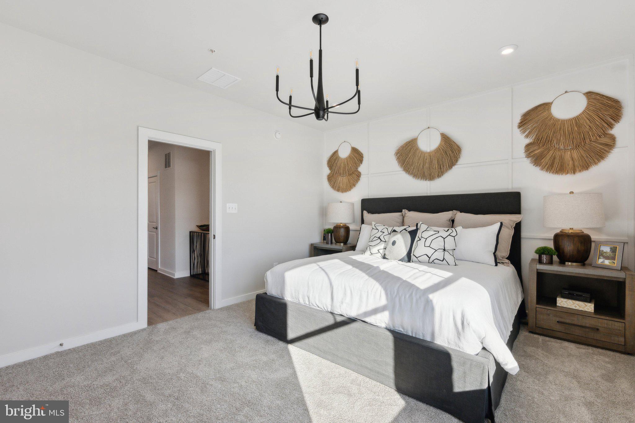 10939 Pinnacle Green Road Upper Marlboro, MD 20772 - Photo 19 of 43 a bedroom with a bed and painting on the wall