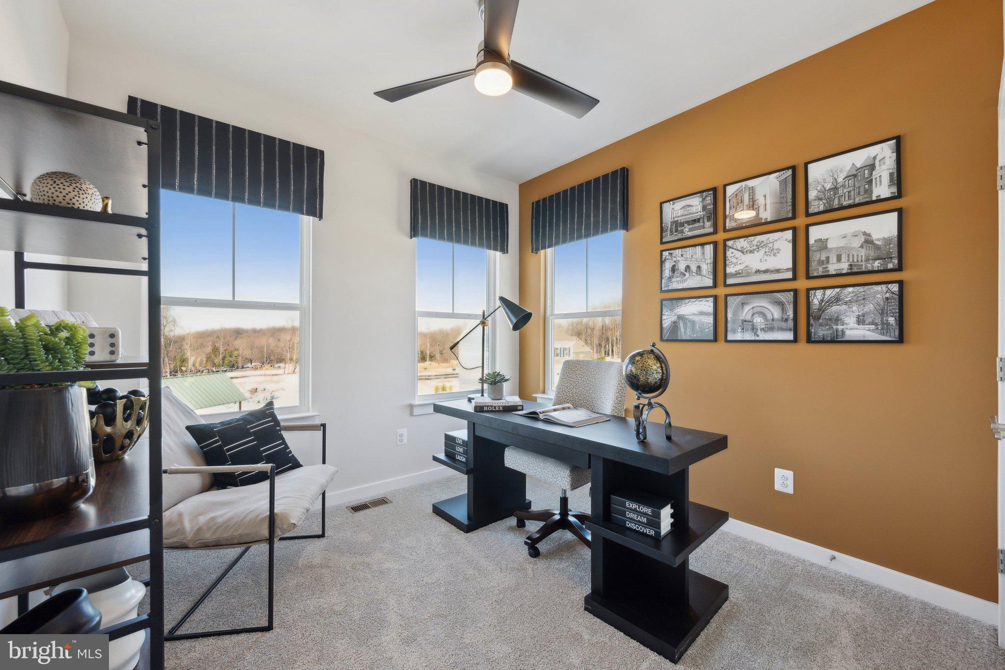 10939 Pinnacle Green Road Upper Marlboro, MD 20772 - Photo 26 of 43 a view of a workspace with furniture and a window