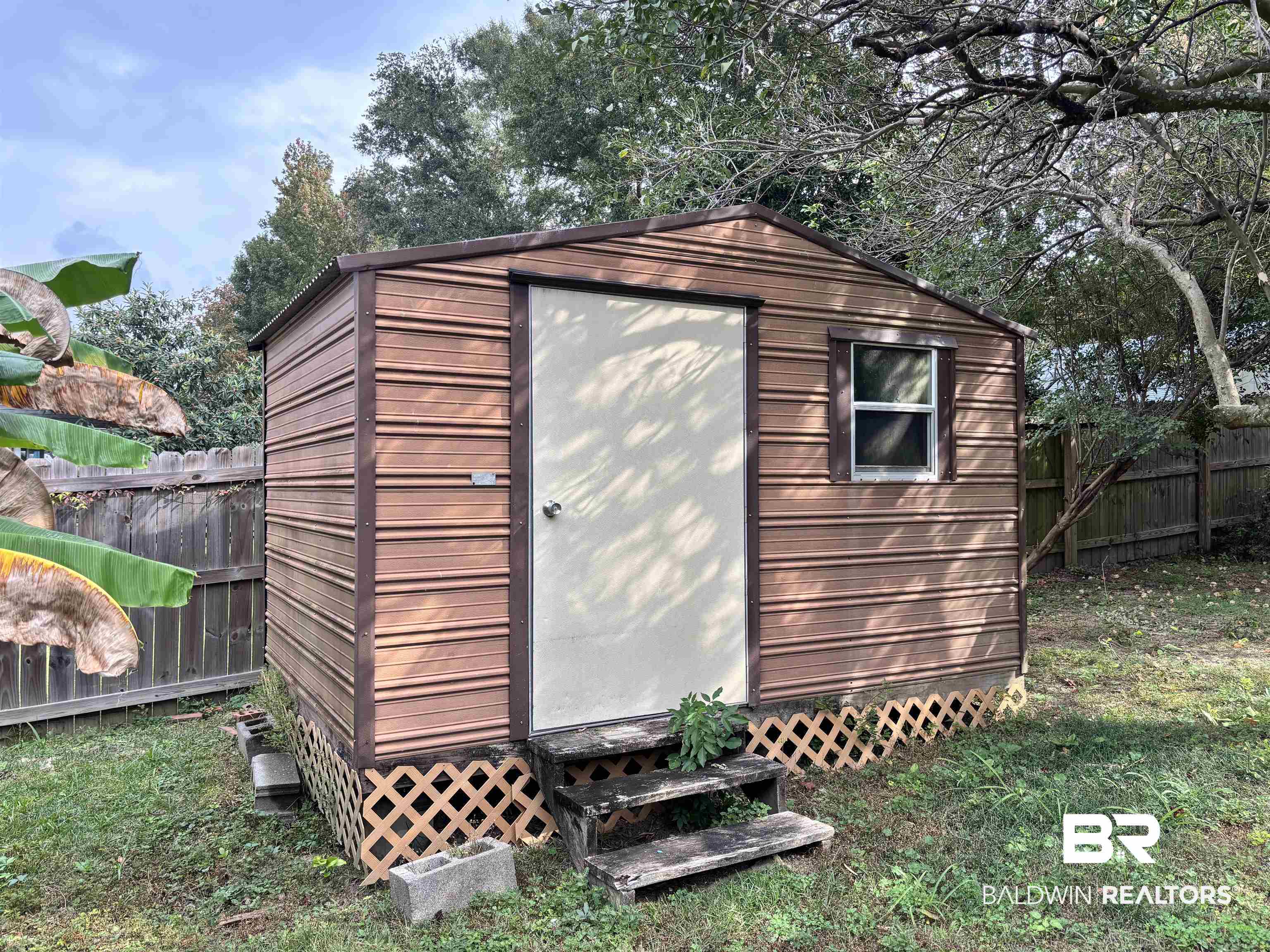10 Soldiers Route Daphne, AL 36527 - Photo 26 of 26 View of shed with a fenced backyard
