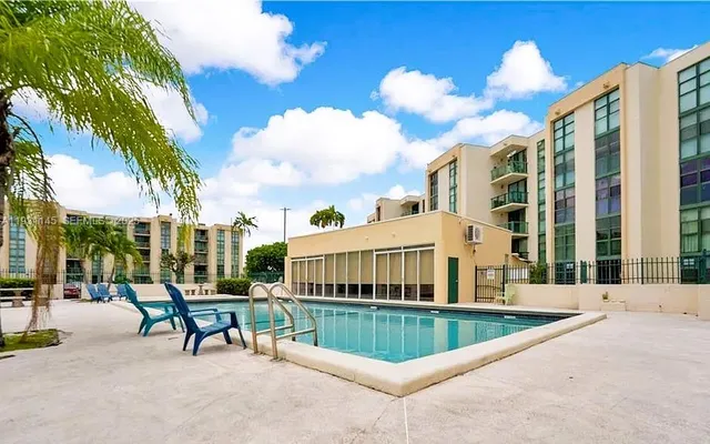 a view of a building with a swimming pool