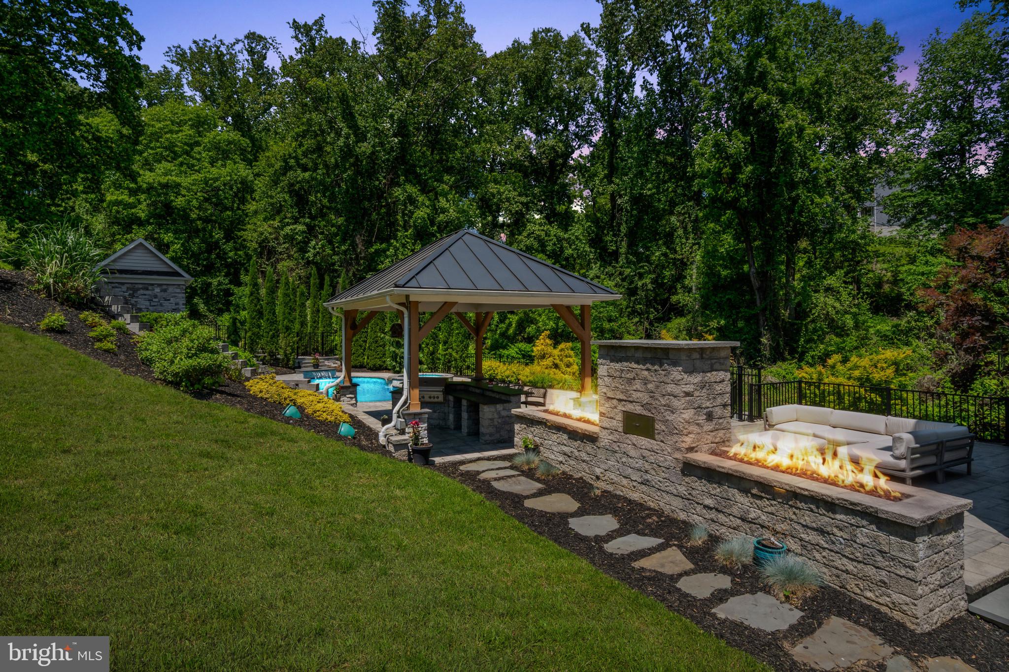 10907 Hollow Road Cockeysville, MD 21030 - Photo 43 of 57 a view of house with backyard outdoor seating and green space