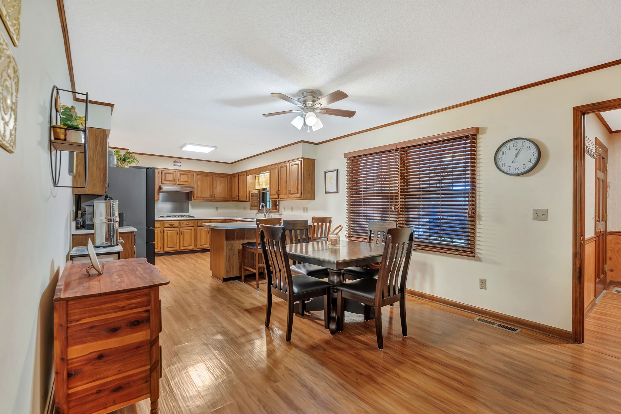 1210 Hills Chapel Road Manchester, TN 37355 - Photo 11 of 33 a view of a dining room with furniture and wooden floor