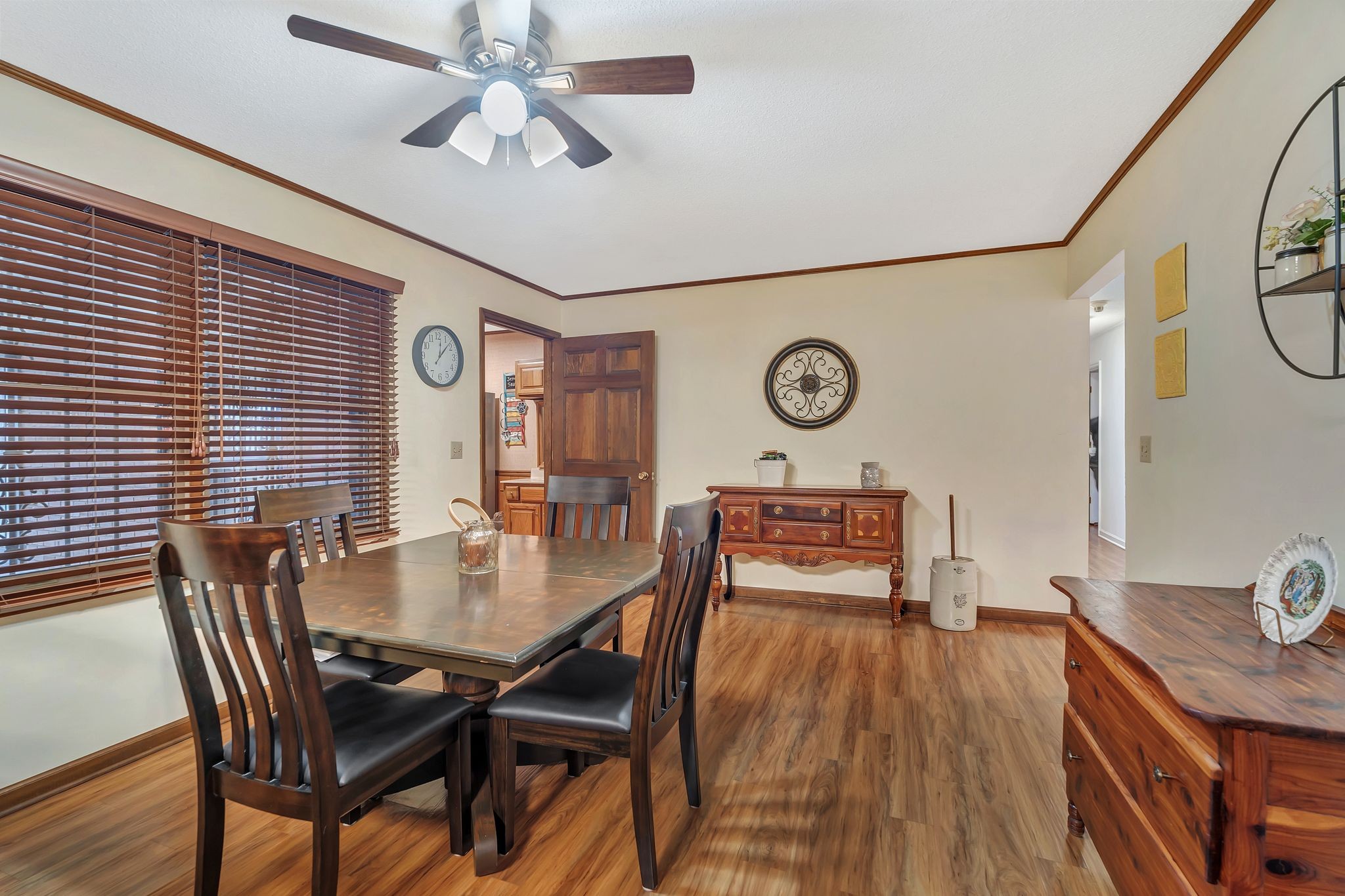 1210 Hills Chapel Road Manchester, TN 37355 - Photo 12 of 33 a view of a dining room with furniture and wooden floor