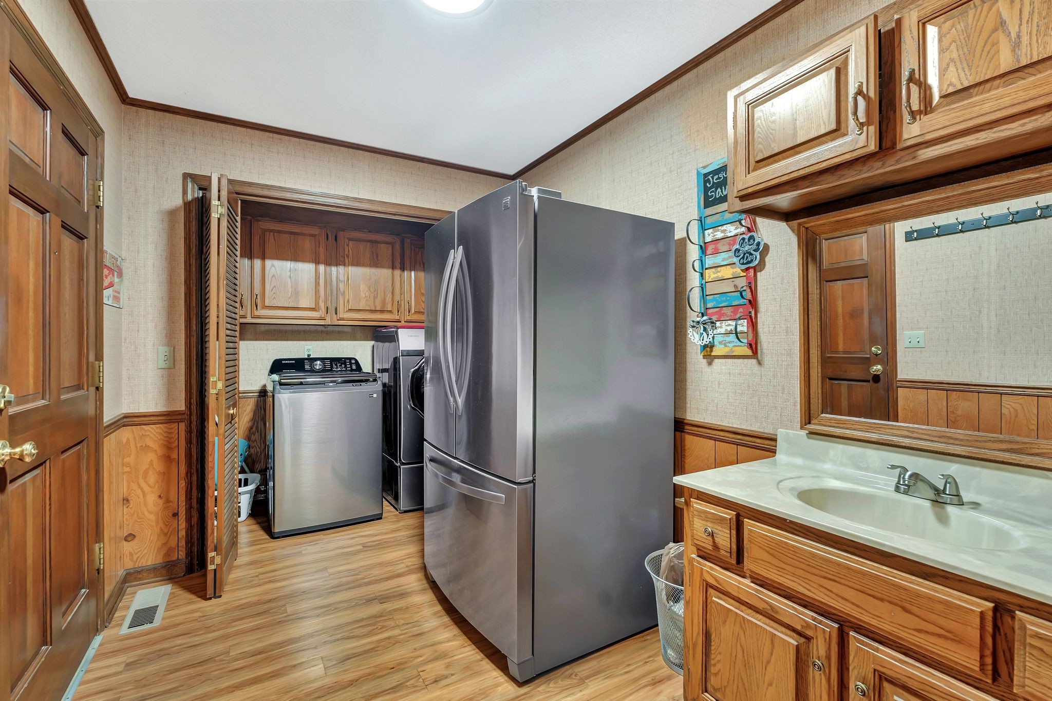 1210 Hills Chapel Road Manchester, TN 37355 - Photo 16 of 33 a kitchen with stainless steel appliances granite countertop a refrigerator and a sink