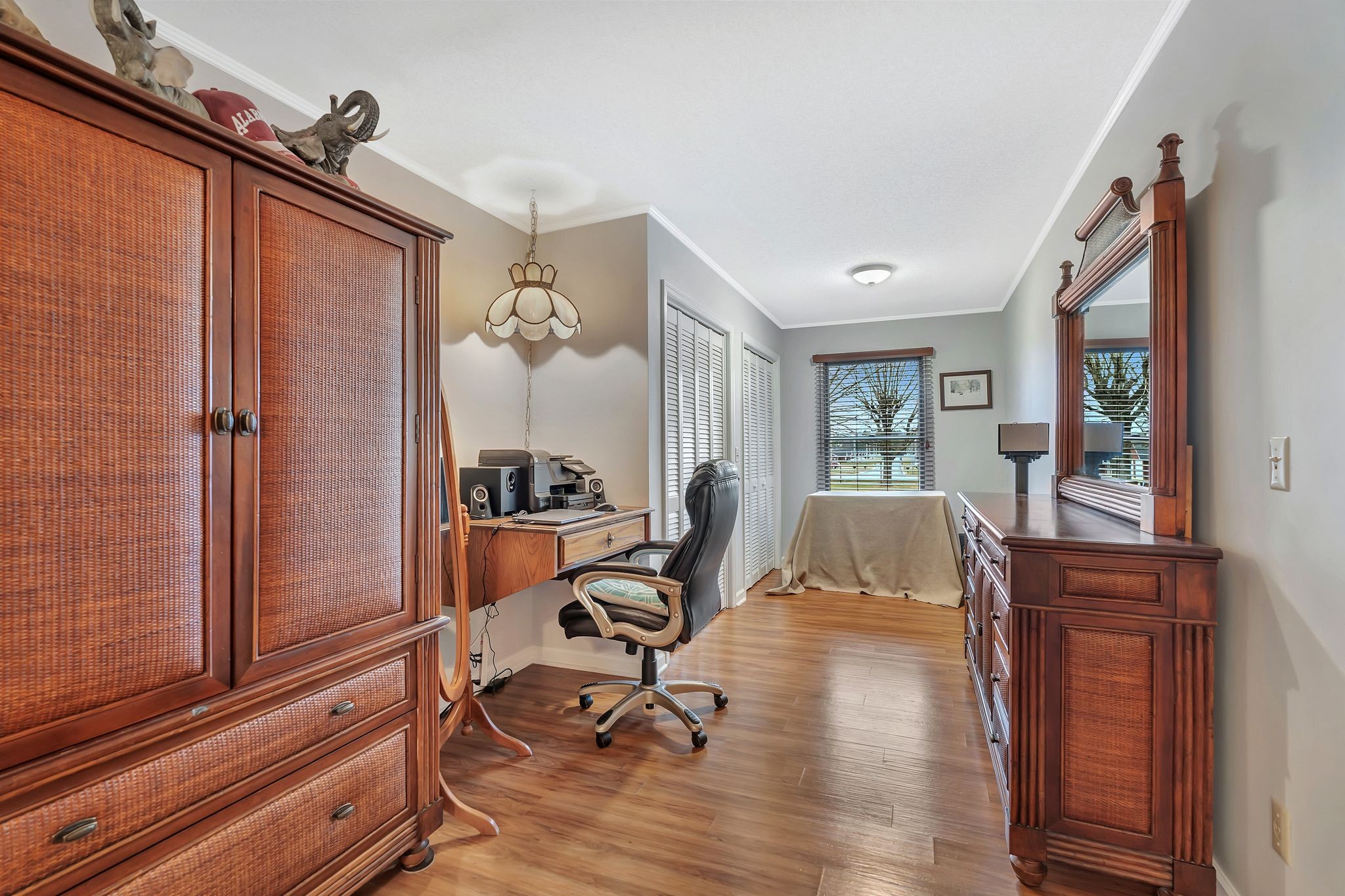 1210 Hills Chapel Road Manchester, TN 37355 - Photo 19 of 33 a view of a workspace with furniture and a window