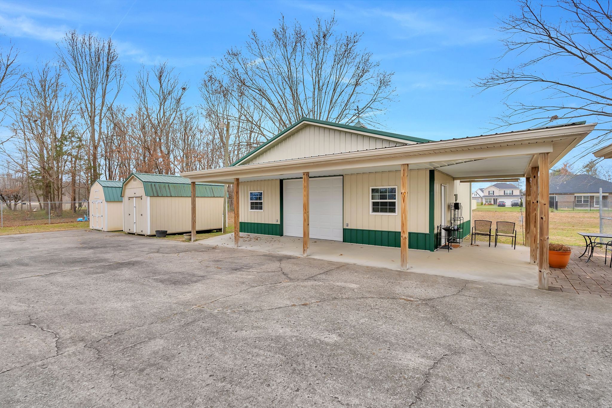 1210 Hills Chapel Road Manchester, TN 37355 - Photo 2 of 33 a view of a house with a backyard and porch