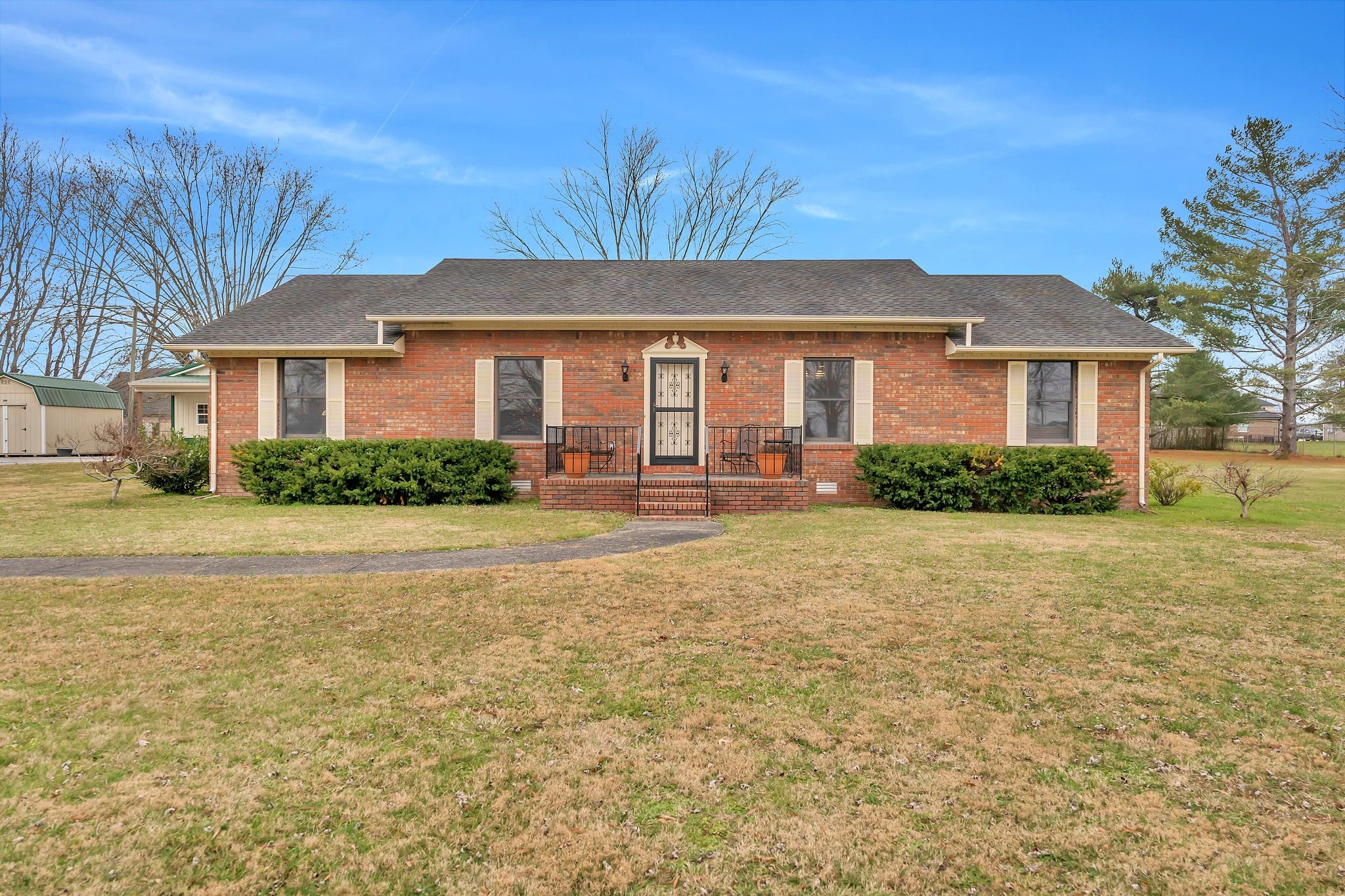 1210 Hills Chapel Road Manchester, TN 37355 - Photo 3 of 33 a front view of a house with garden