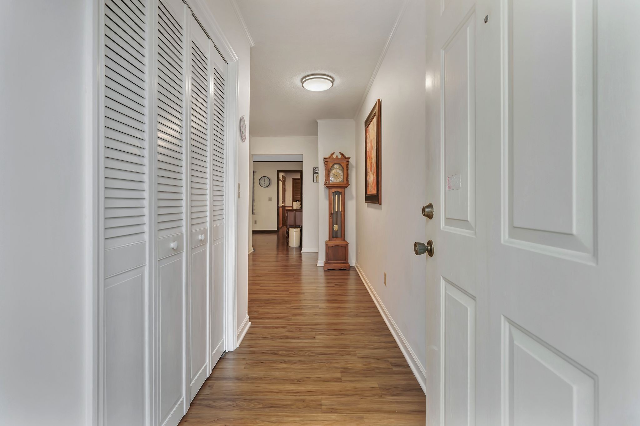 1210 Hills Chapel Road Manchester, TN 37355 - Photo 7 of 33 a view of a hallway with wooden floor