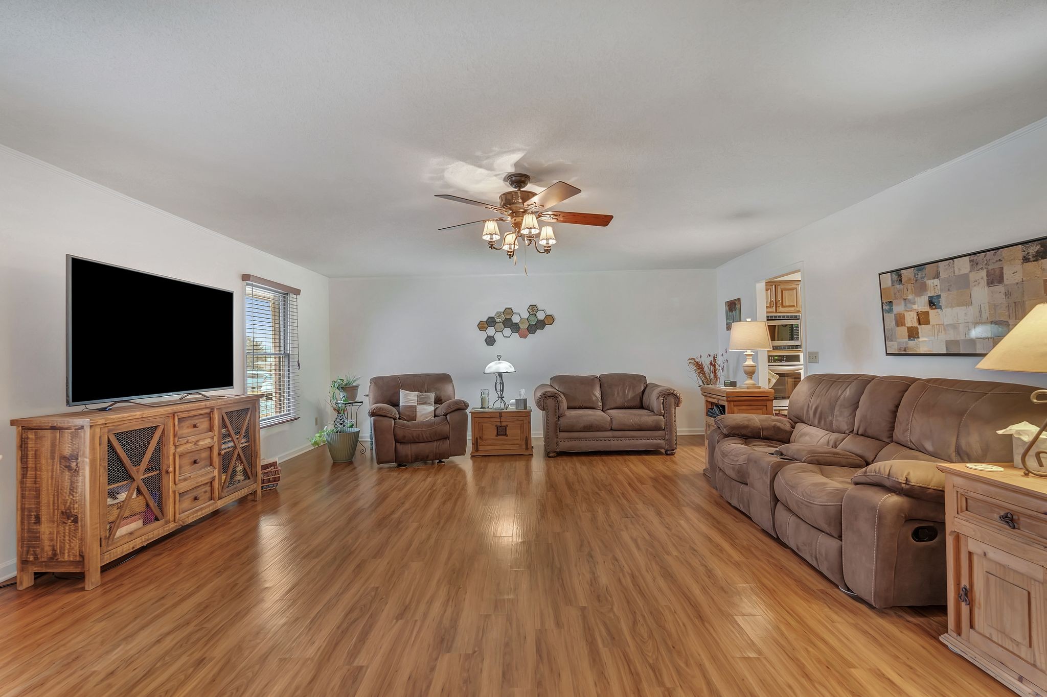 1210 Hills Chapel Road Manchester, TN 37355 - Photo 8 of 33 a living room with furniture and a flat screen tv