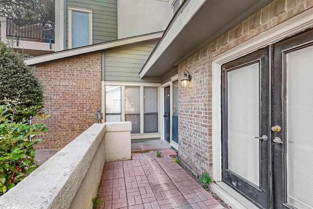 9611 Walnut Street, Unit 1105 Dallas, TX 75081 - Photo 22 of 24 a narrow alley leading to a building