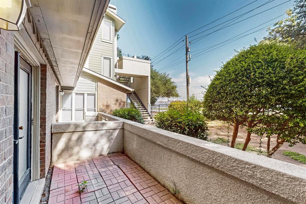 9611 Walnut Street, Unit 1105 Dallas, TX 75081 - Photo 23 of 24 a view of a house with a large window