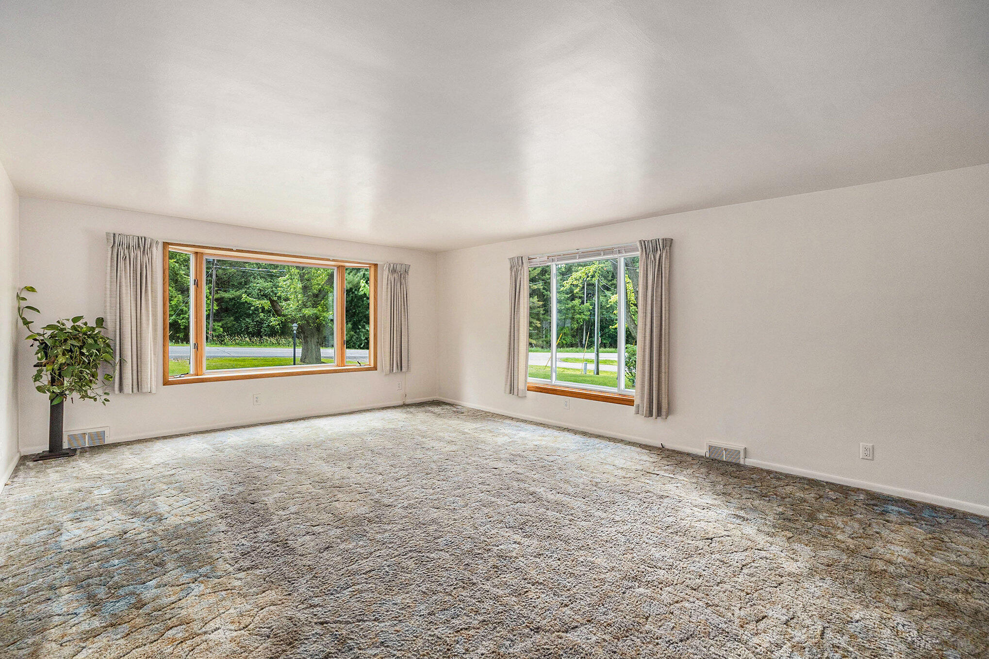 1978 Lakeshore Road Manistee, MI 49660 - Photo 8 of 37 Bay window in large living room
