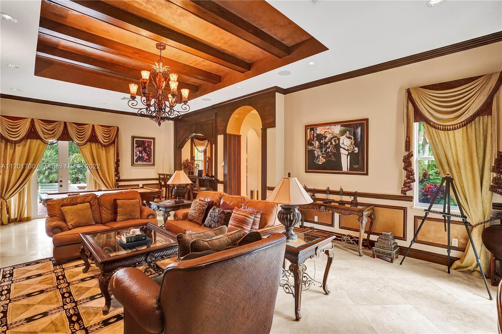 3460 Paddock Road Weston, FL 33331 - Photo 11 of 62 a very nice looking living room with a large window