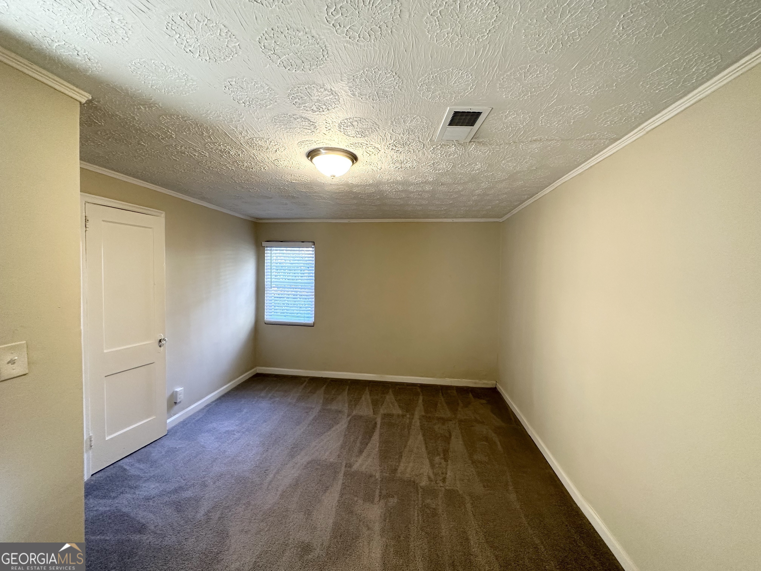 1876 Flat Shoals Road Southeast Atlanta, GA 30316 - Photo 8 of 11 wooden floor in an empty room