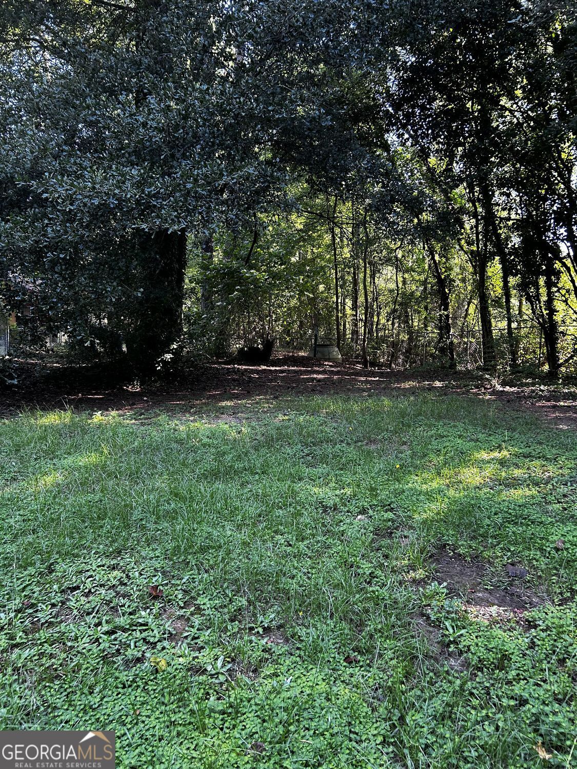610 Roy Huie Road Riverdale, GA 30274 - Photo 7 of 24 a view of a green yard