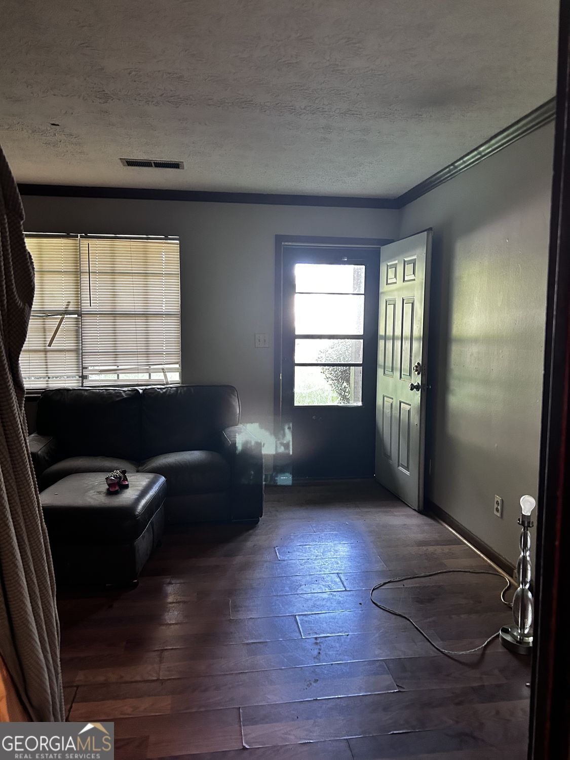 610 Roy Huie Road Riverdale, GA 30274 - Photo 10 of 24 a living room with furniture window and wooden floor